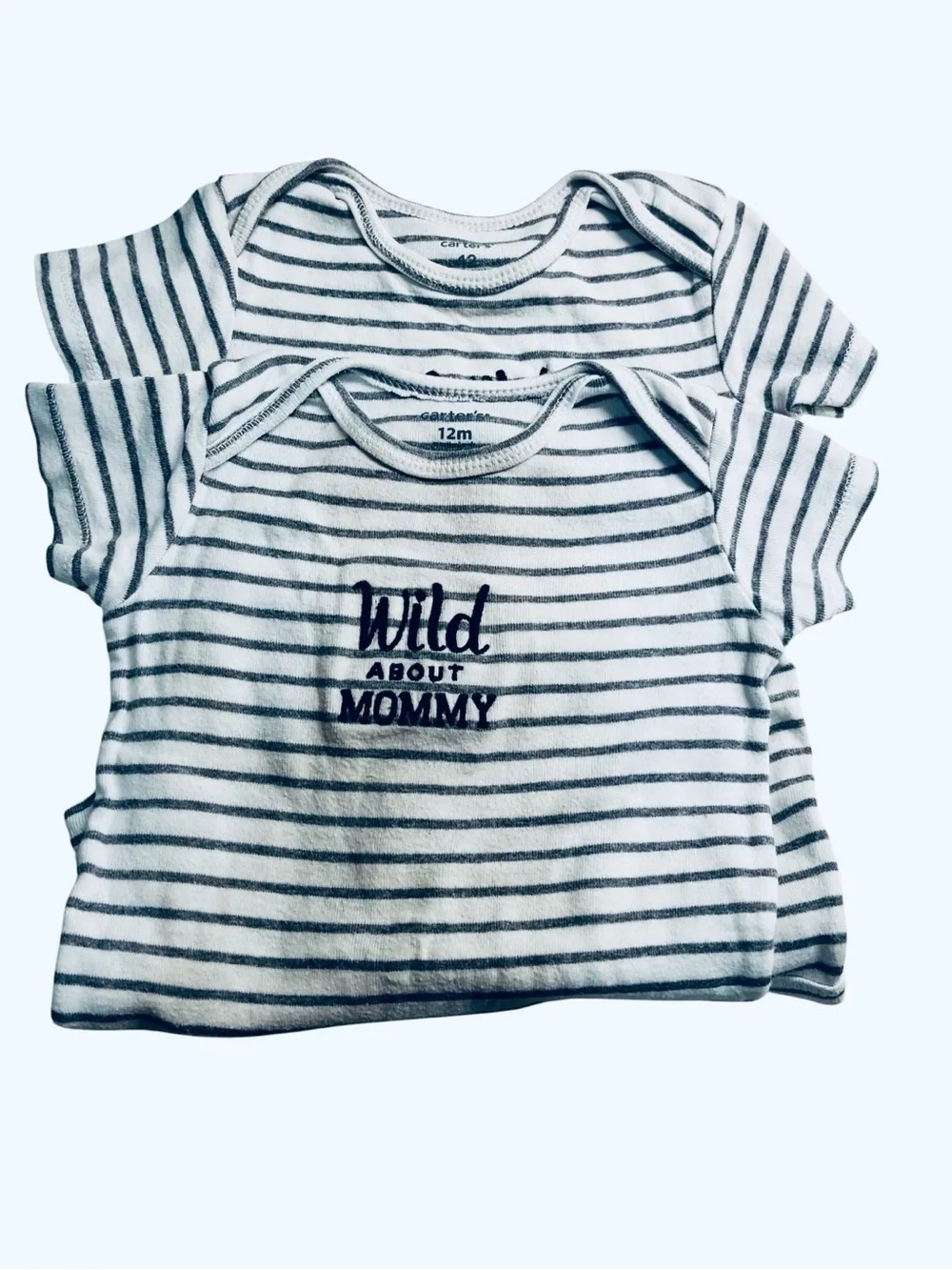 Carter’s cotton stripped onesie set 